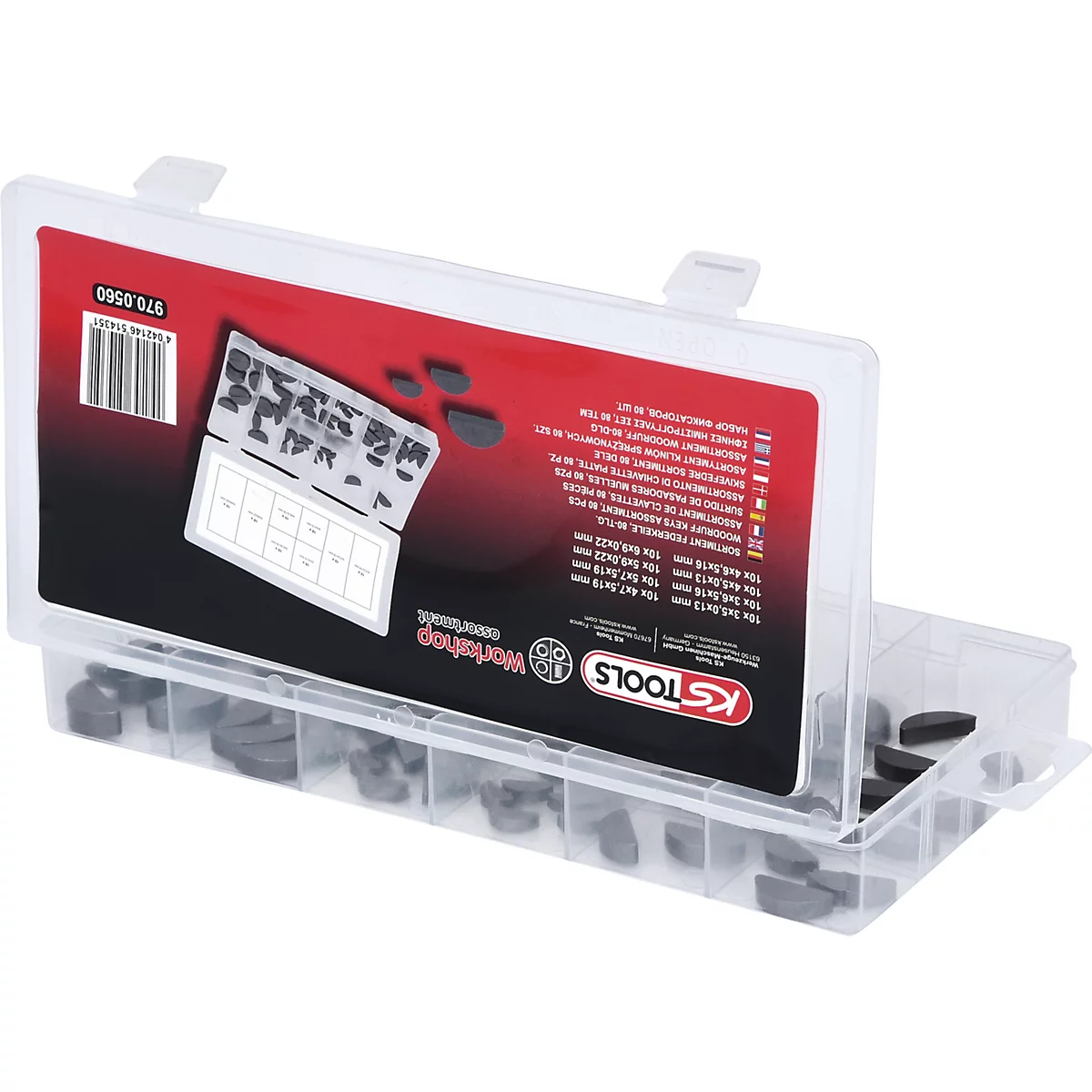 Eine transparente Box mit schwarzem Inhalt und Aufklebern. Darin befindet sich eine große Anzahl schwarzer Keile.